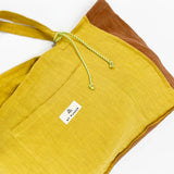 Sac moyen en lin moutarde + <tc>Trousse de Toilette</tc>